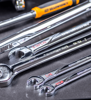 GEARWRENCH ratchets, wrenches, and torque wrenches on work table top