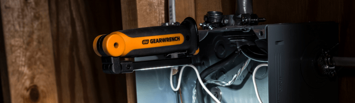 GEARWRENCH Flex Head Light being used to light up a fuse box